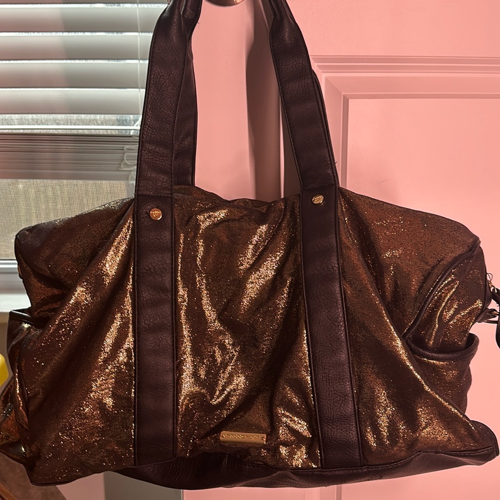 Madden girl medium gold duffle bag
